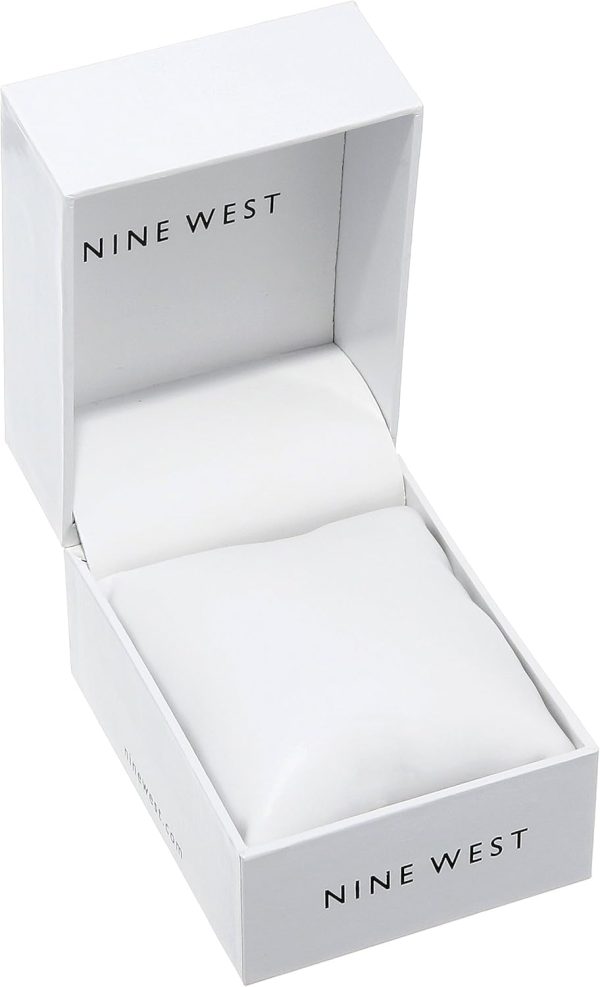 Nine West Women's Metal Bracelet Watch with Rubberized Coating metal magazine